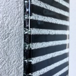Striped Glass Wall Clock - close-up